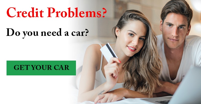 Credit-problems-get-your-car young couple with laptop getting bankruptcy car loan